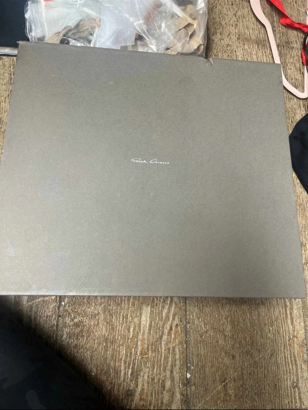 Rick Owens Black Leather High-Top Boat Sneakers with White Toe Caps